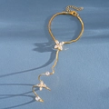 Catena per mano dorata con motivi a fiori e farfalle e pietre di zircone scintillanti - Oro con Punto
