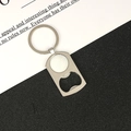 Silver metal golf ball bottle opener keychain featuring realistic dimple texture - Golf/Bottle Opener