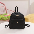Mini black leather backpack with embossed clover patterns and golden hardware - Black