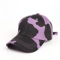 Detail of purple and black cow print cotton baseball cap with adjustable metal buckle - Adjustable / Purple Cow