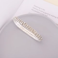 Detail of silver double-row rhinestone elastic bracelet on minimalist grey display tray - 2 Layers Style
