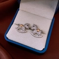 Macro view of crystal encrusted rocking horse stud earrings in a luxury jewelry box - 43# Silver Pin-Silver-Horse-Silver Pave Rhinestone Rocking Horse Studs