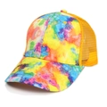 Close-up of vibrant tie-dye pattern on the front and bright yellow mesh of the baseball cap - Colorful