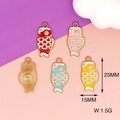 Detail view of 25mm koi fish enamel pendants in various colors with size specifications - Red Koi