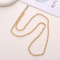 Detail of beige acrylic crossbody phone strap with durable metal clasp and connector - Crossbody Chain / Khaki