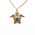 Elegant gold turtle necklace with green teardrop crystal and clear stones on white background - Green Gemstone Sea Turtle