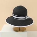 Detail of black straw sun hat featuring elegant white ribbon trim and chic side knot - Adult 55-58cm / Contrast Trim Style / Black