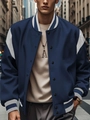 Detail of navy blue varsity jacket featuring white contrast sleeves and ribbed collar - Navy Blue