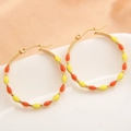 Boucles d'oreilles créoles dorées avec émail jaune et orange et motifs géométriques - Orange Jaune (EE03-5)