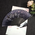 Classic black folding fan with butterfly and flower patterns plus a black silk tassel - Butterfly & Cherry Blossom - Black Handle