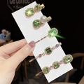 Detailed view of 5-piece vintage emerald rhinestone hair clip set with pearls - Fruit Green Gold 5-Piece Set