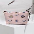 Pink evil eye makeup bag on display with zipper detail and lavender decoration - Pink All-Over Various Eyes