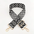 Detail of 5cm adjustable black and white diamond pattern bag strap with gold hooks - Black
