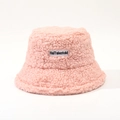 Detailed view of pink lamb wool bucket hat featuring letter embroidery label and soft texture - M (56-58cm) / Pink