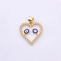Makroaufnahme eines goldenen herzförmigen Evil-Eye-Anhängers mit funkelnden Zirkonen - Stil 4-Hohlherz Doppelte Blaue Augen