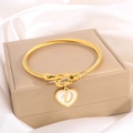 Golden titanium steel twisted rope bracelet with a heart pendant featuring letter V - Letter U