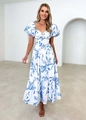 Detailed view of the blue and white floral dress featuring a knot cutout and layered skirt - S / Blue White Print