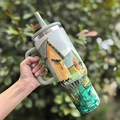 Insulated stainless steel tumbler with handle and straw featuring floral illustration - 40oz / Fisherman's Dwelling