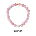 Macro detail of Larimar and purple Glauberite beads with gold accents on the bracelet - Larimar Kunzite Gold Accent Style (WB335)