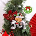 Plush Christmas bear ornament with JOY fabric letters hanging on a decorated tree - JOY Letter Pendant Bear