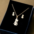 Golden cat necklace and earrings set presented in a premium blue velvet jewelry box - Cat Silhouette