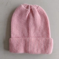 Pink ribbed knit beanie hat for women featuring a soft texture and casual winter style - Sakura Pink