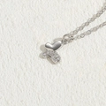 Silver butterfly necklace with micro-paved cubic zirconia and polished mirror finish wings - Heart Butterfly Zirconia White Gold