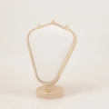 Detail view of a luxury velvet necklace display stand with premium solid wood frame - Natural Wood White Leather