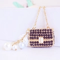 Golden handbag keychain with black rhinestones and imitation pearl charms - Individual Packaging / Black