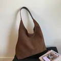 Minimalist large brown suede hobo bag with wide shoulder strap on a simple background - With Inner Bag / Brown