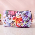 Floral print PU leather makeup bag with daisy pattern and golden zipper detail - Hand-painted Colorful Flowers
