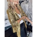 Close-up of golden sequin fabric texture on a long-sleeved women blazer jacket - S / Gold