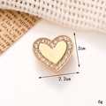Detailed view of a 2.2x2cm gold heart charm with rhinestones for DIY shoe accessories - C240 Gold Rhinestone Heart