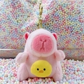 Pink capybara plush keychain featuring yellow chick design on soft textured material - Holding Chick Pink + Gold Clip