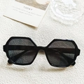 Schicke Oversize-Sechseck-Sonnenbrille in Schwarz mit glänzender Fassung für modernen Look - Schwarz und Grau