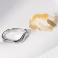 Minimalist silver wavy open ring made of stainless steel on artistic background - US 7 / Simple Wave Shape (JR191) / Steel