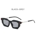 Modern oversized geometric sunglasses featuring thick black frames and grey lenses - Black Frame Light Gray Lens