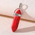 Macro shot of red hexagonal natural stone pendant with black veined patterns and silver clasp - Red Howlite