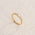 Elegant gold titanium steel ring with three iridescent opal stones in a slim band design - Gold with Multicolor Zircon