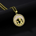 Macro detail of gold-plated mother and child pendant with shell inlay and zircon border - Style C (Round Mother-Child/Shell Background)