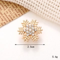 Macro detail of golden snowflake charm with rhinestones measuring 2.5cm and weighing 5.6g - C266 25mm Gold Rhinestone Snowflake