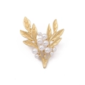 Baroque golden leaf brooch with white pearls in a cluster floral pattern design - Pearl Cluster