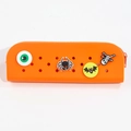 Orange DIY silicone pencil case with Halloween themed charms and hole design - Small / Orange