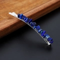 Detail of silver hair clip with handmade deep blue natural crystal stones on dark wood - Lapis Lazuli with Silver Clip