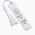 Detailed view of silver stainless steel bookmark with white tassel and witty quote - A39-Vulgar Symbol Tassel