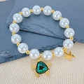 Bracciale di perle con ciondoli a tartaruga marina e stella marina dorati e cuore verde - Tartaruga