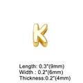 Macro shot of gold letter K pendant with dimensions 9mm by 6mm and 4mm thickness - Letter K