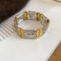 Detail of two-tone stretch bracelet with hollow heart charms and Faith Love engravings - 3# Gold-Silver Faith Love Engraved Bracelet