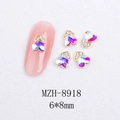 Macro view of heart-shaped nail art charm with AB stone and gold base on pink nail tip - Gold Heart Style With AB Crystal (8918)