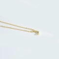 Minimalist gold letter J pendant necklace with a delicate chain for women - Letter J